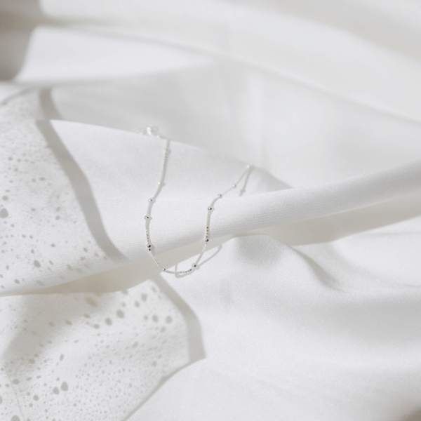 Waterproof Modern Dotted Necklace on white sheet