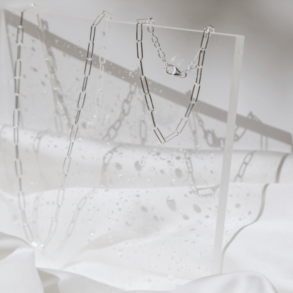 Waterproof Paperclip “Paris” Bracelet on clear stand with water droplets