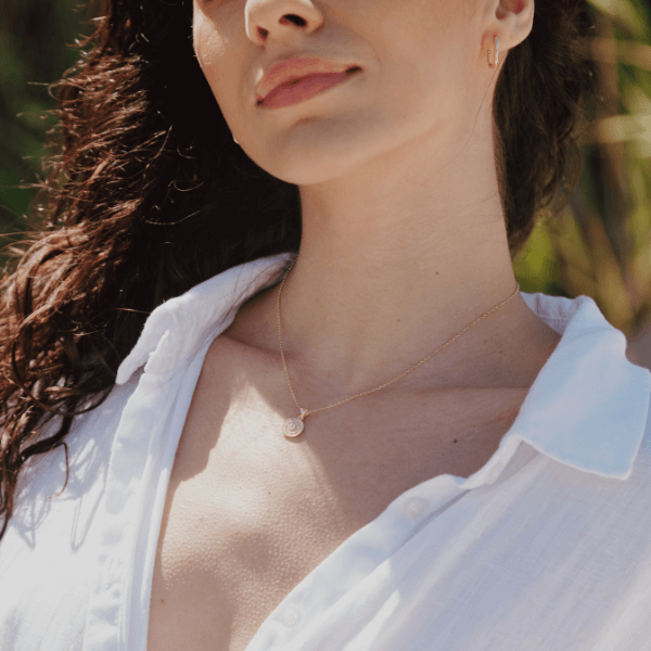 Egyptian Shield Pendant Necklace on models neck