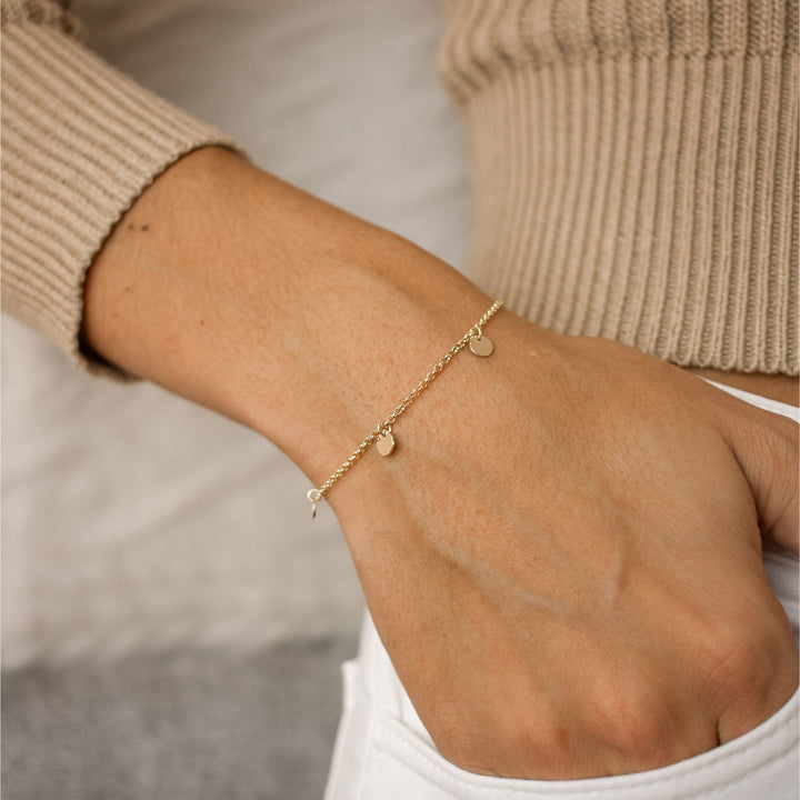 Waterproof Multi Disc Bracelet on models hand