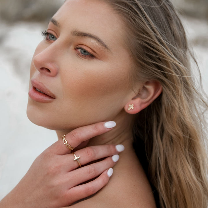 large cross stud earrings model image