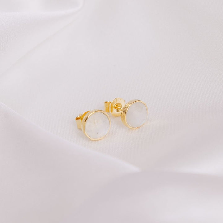moonstone studs on a white cloth