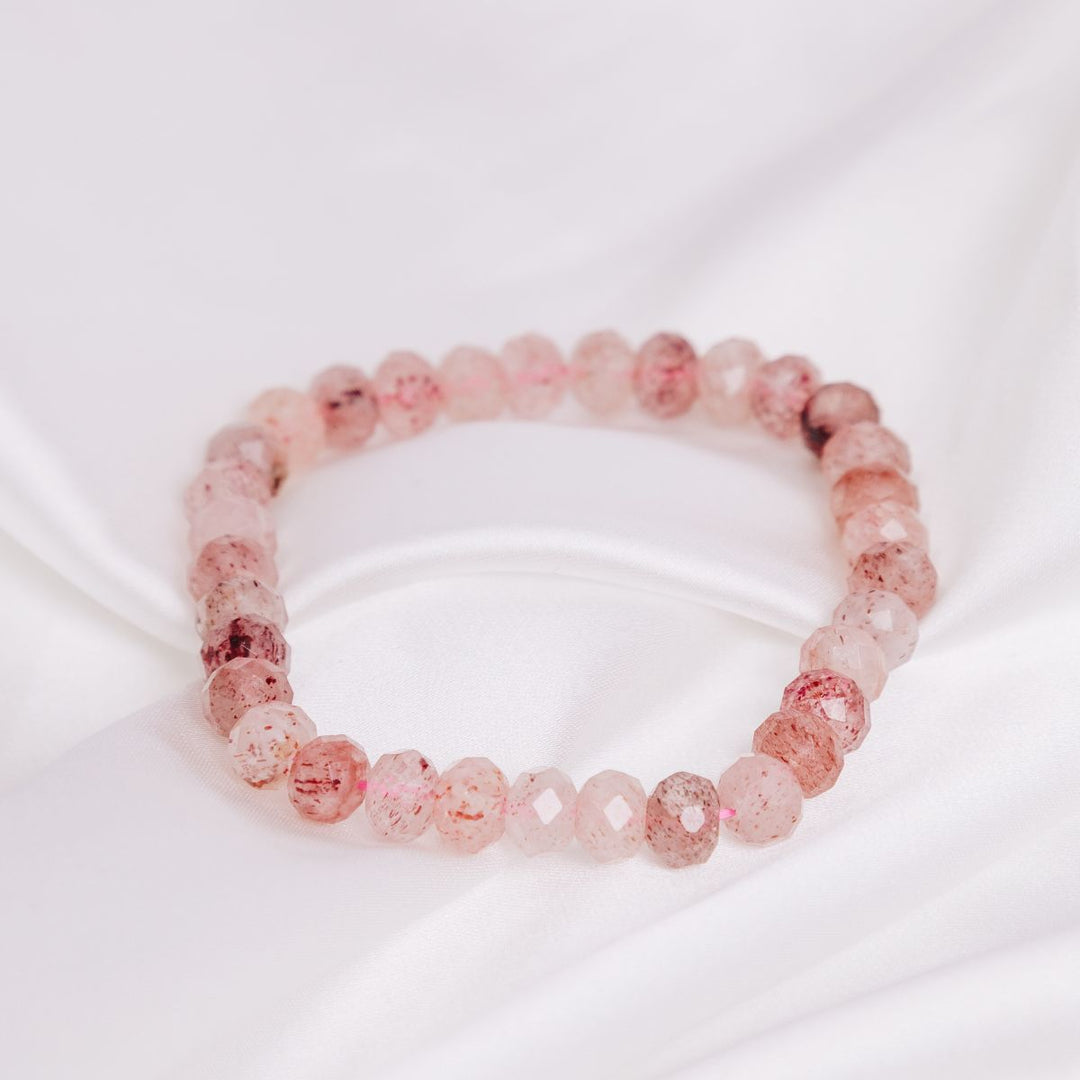 a light pink coloured stone bracelet 