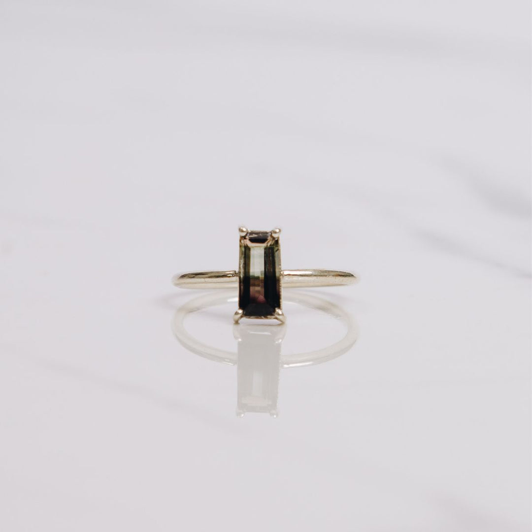 a very bold rectangular shaped ring on a white background