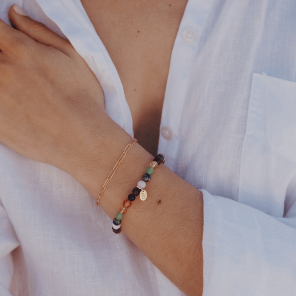 Waterproof Paperclip “Paris” Bracelet stacked with stone bracelet on model wrist